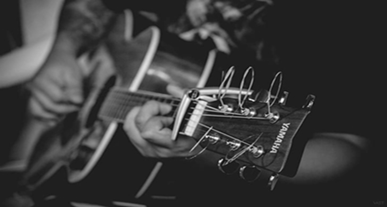 Someone Playing the Guitar